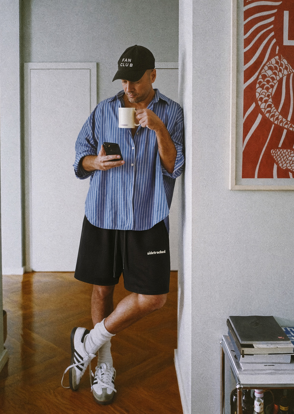 Model wearing black Sidetracked vintage wash cotton shorts