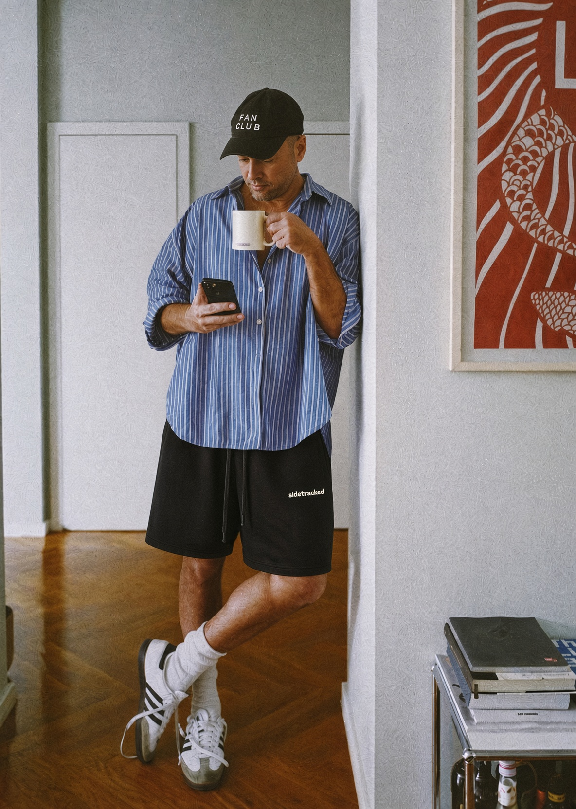 Model wearing black Sidetracked vintage wash cotton shorts